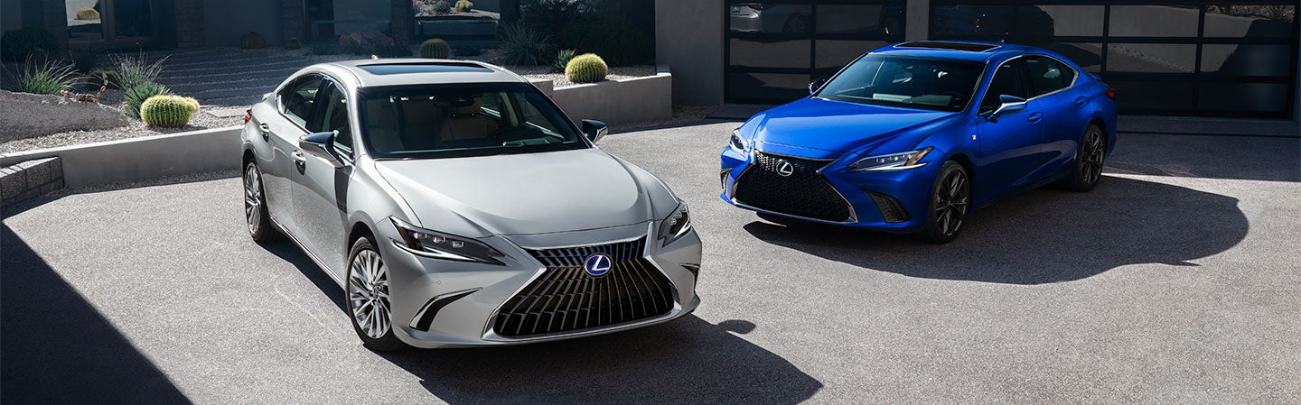 Exterior of the Lexus ES Hybrid shown in Iridium and the ES F SPORT shown in Ultrasonic Blue Mica 2.0.