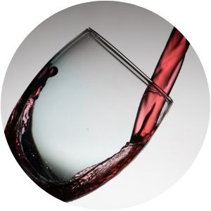 Red Wine Pouring into a Glass