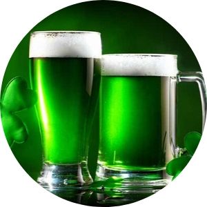 Green Beer on Dark Background with Green Shamrocks