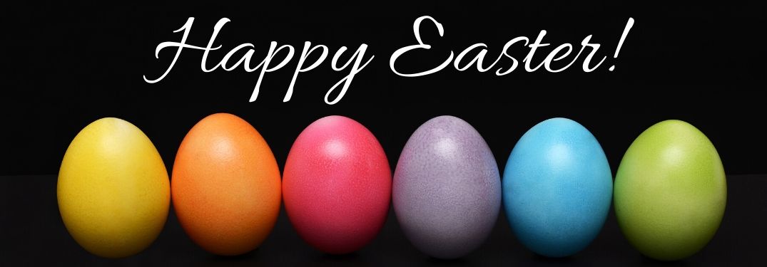 Colored Eggs on a Black Background with White Happy Easter Text