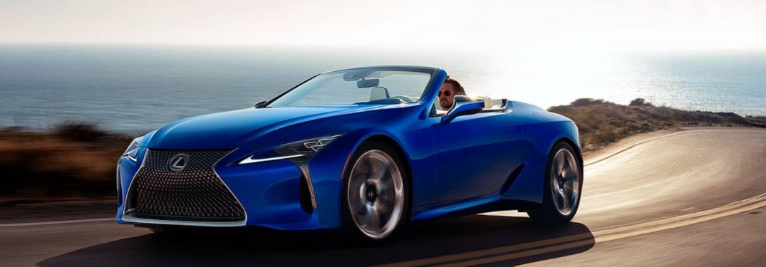 2021 Lexus LC driving down an oceanside road