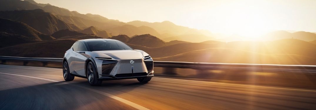 White Lexus LF-Z Electrified Concept on a Mountain Road at Sunset