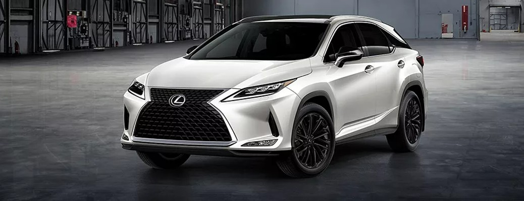 A white 2022 Lexus RX parked in a warehouse