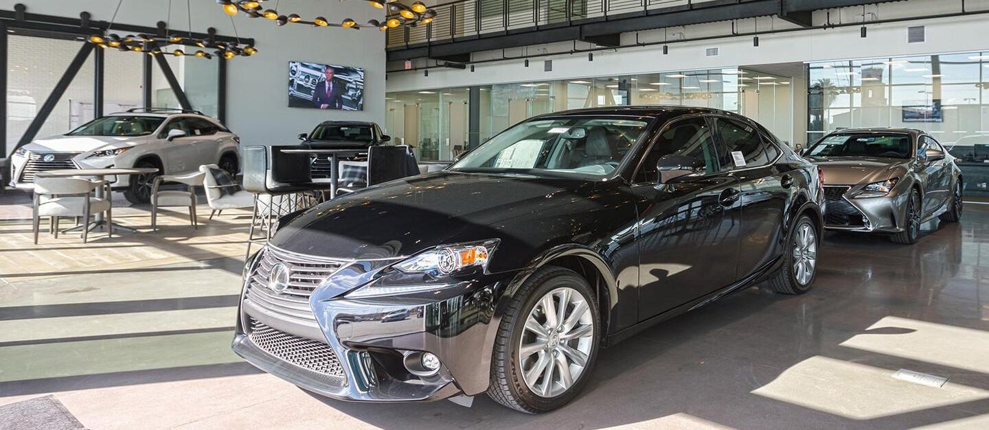The 2026 Lexus RX at Earnhardt Lexus Phoenix achieves a cleaner, more sculpted look thanks to the way its distinctive grille blends seamlessly into the headlights.